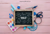 Back To School Composition With Slate On Wooden Surface Psd