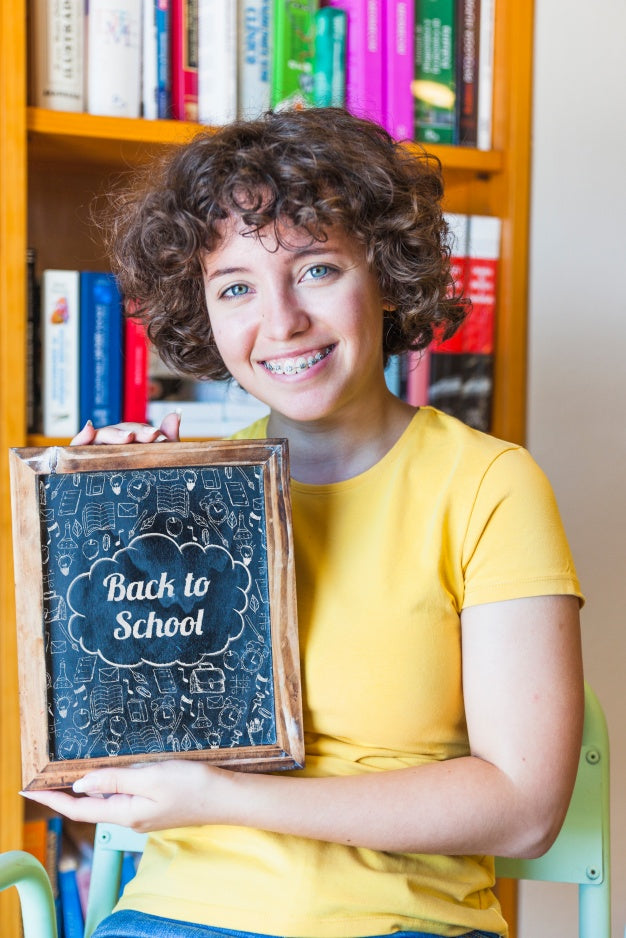 Back To School Concept With Girl Showing Slate Psd