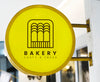 Bakery Store'S Yellow Shop Sign Mockup Psd