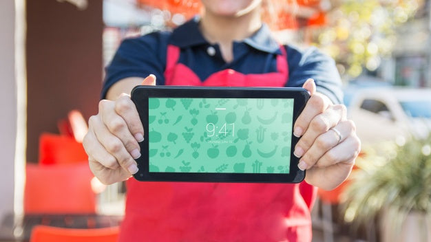 Barman Holding Tablet Mockup For App Presentation Psd