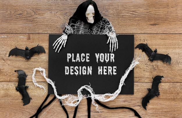 Bats And Skeleton On Wooden Table Psd