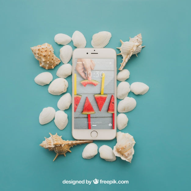 Beach Concept With Smartphone And Shells Psd