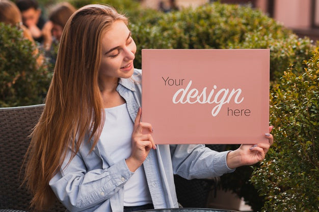 Beautiful Girl Holding A Banner Mock-Up Psd