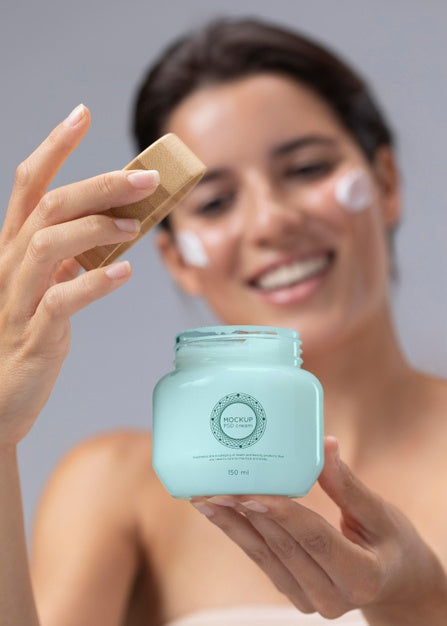 Beautiful Smiley Woman Holding Cream Jar Mock-Up Psd