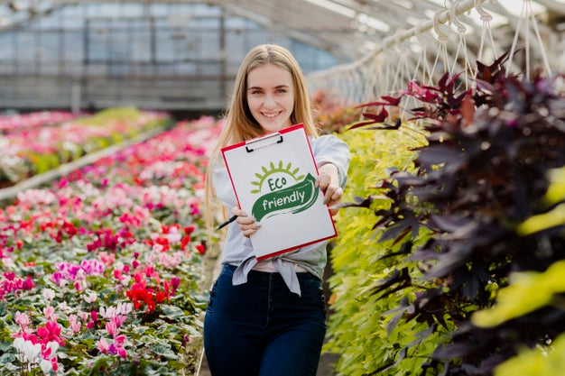 Beautiful Young Girl Holding Eco Friendly Sign Psd