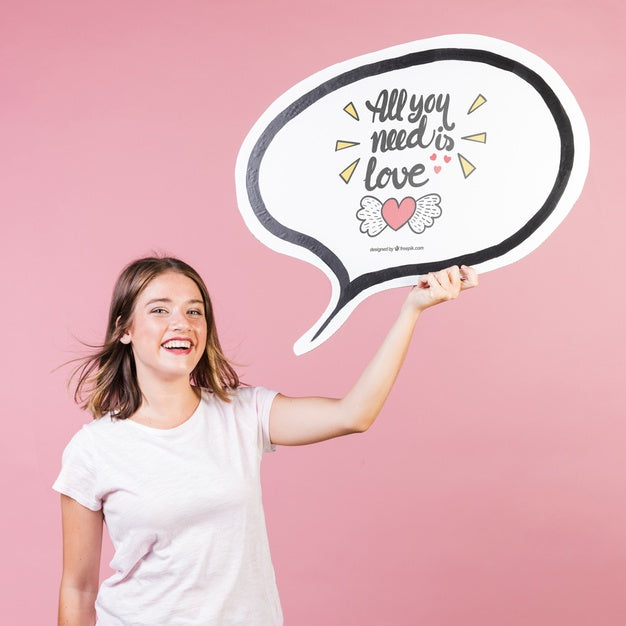 Beautiful Young Woman Holding Up A Board Mock-Up Psd