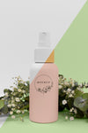 Beauty Product Spray Bottle With Plant Psd