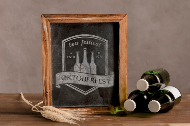 Beer Bottles Next To Oktoberfest Frame Psd