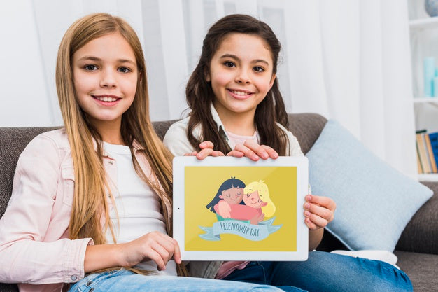 Best Friends Holding A Tablet Mock-Up Psd