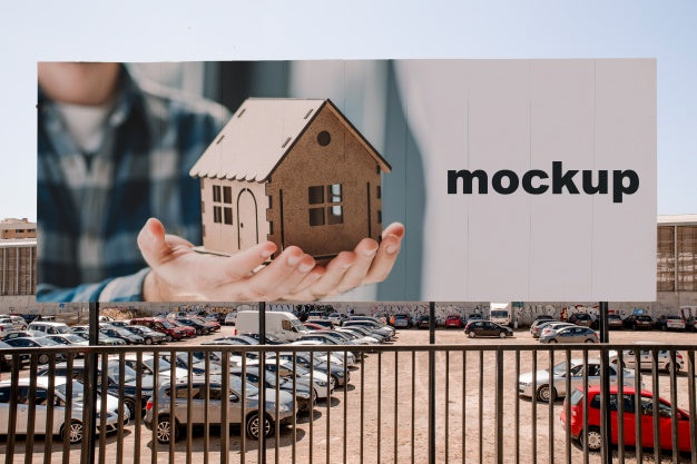 Billboard Mockup In Front Of Parking Lot Psd