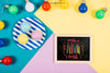 Birthday Mockup With Slate And Colorful Bubls Psd