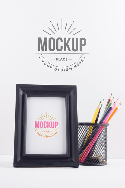 Black Frame Mock-Up Next To Stationery Elements Psd