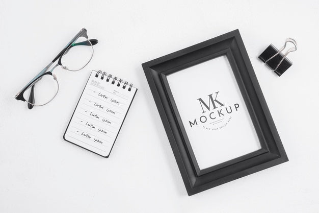 Black Frame Mock-Up Next To Stationery Elements Psd