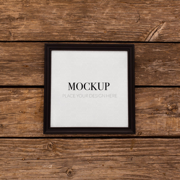 Black Frame Mockup On Retro Wood Psd