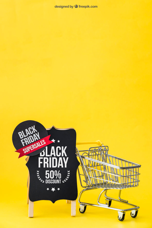 Black Friday Mockup With Shopping Cart Next To Board Psd