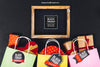 Black Friday Mockup With Slate And Bags Full Of Presents Psd