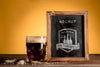 Black Mug Of Beer With Mock-Up Frame Psd