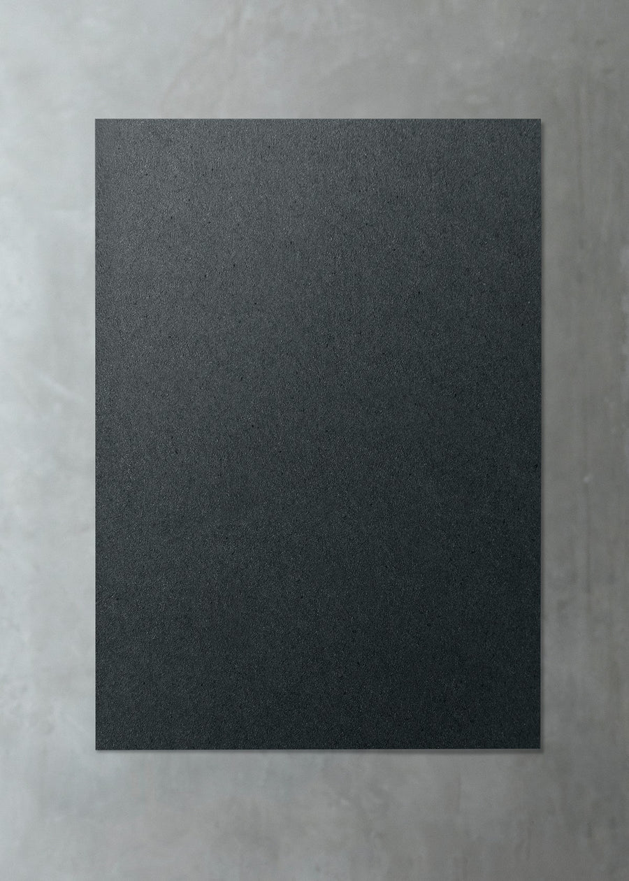 Black Paper On A Gray Marble Background