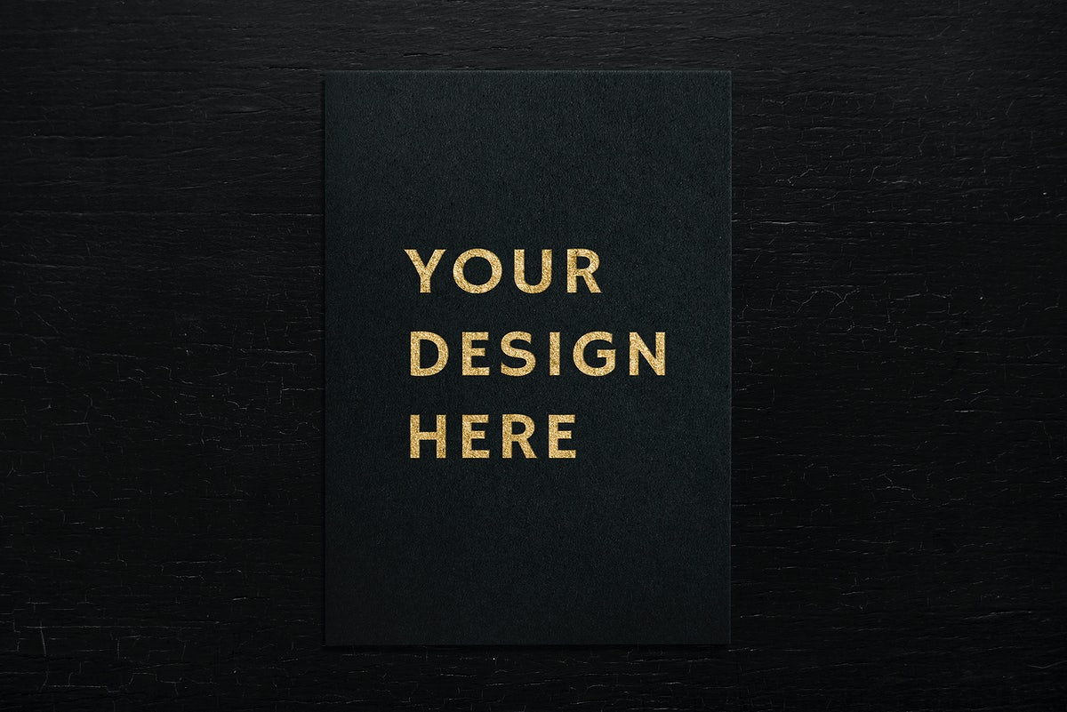 Black Paper On A Wooden Background