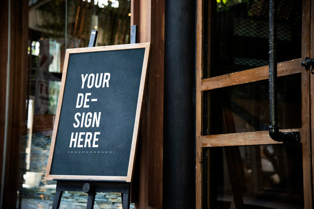 Blackboard Sign Mockup In Front Of A Restaurant Psd