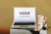 Blank Laptop Screen And A Pink Coffee Cup Psd