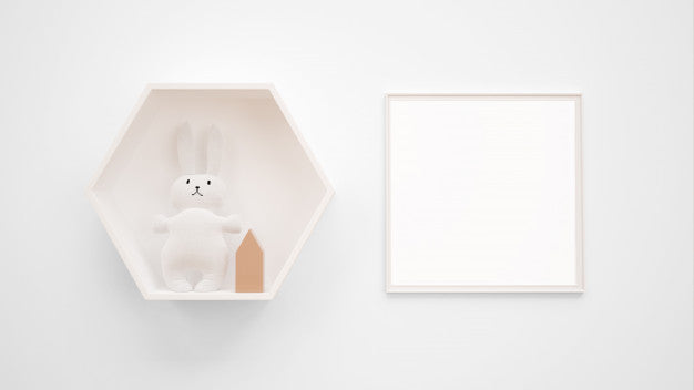 Blank Photo Frame Mockup Hanging On The Wall Next To A Bunny Toy Psd
