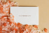 Blank White Business Card On Orange Gravel Psd