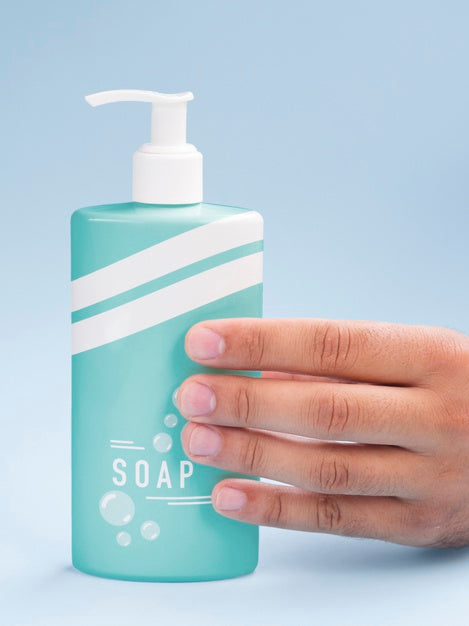 Blue Liquid Soap Bottle On Blue Background Psd