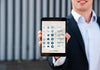 Blurred Man Holding Digital Tablet Outdoors Psd