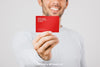 Blurred Man With Business Card In Foreground Psd