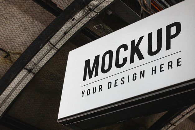 Board Mockup Hanging At A Train Station Psd