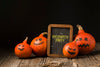 Board With Halloween Message And Pumpkins Psd