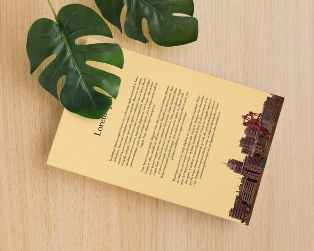 Book Cover Arrangement With Leaves Psd