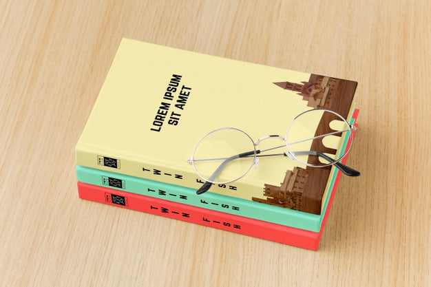 Book Cover Assortment On Wooden Background Psd