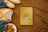 Book Cover Mockup With Bread And Cinnamon Psd