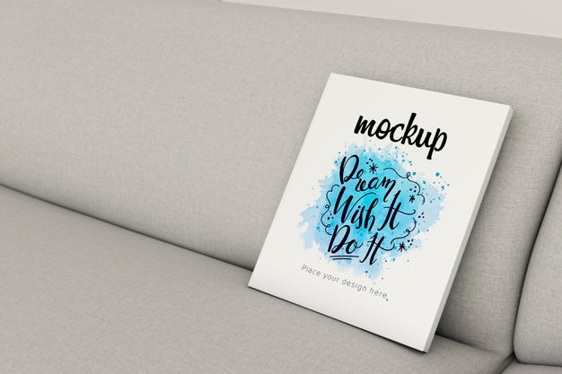 Book Mock-Up On Sofa Indoors Psd