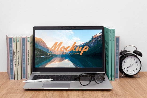 Books And Laptop Arrangement Psd