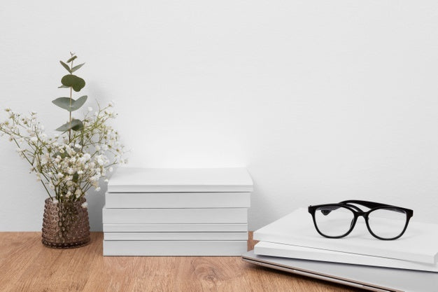 Books And Plant Arrangement Psd