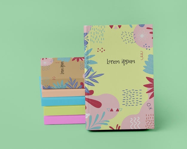 Books Arrangement On Green Background Psd