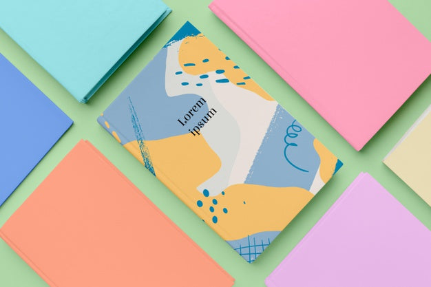 Books Assortment On Green Background Psd