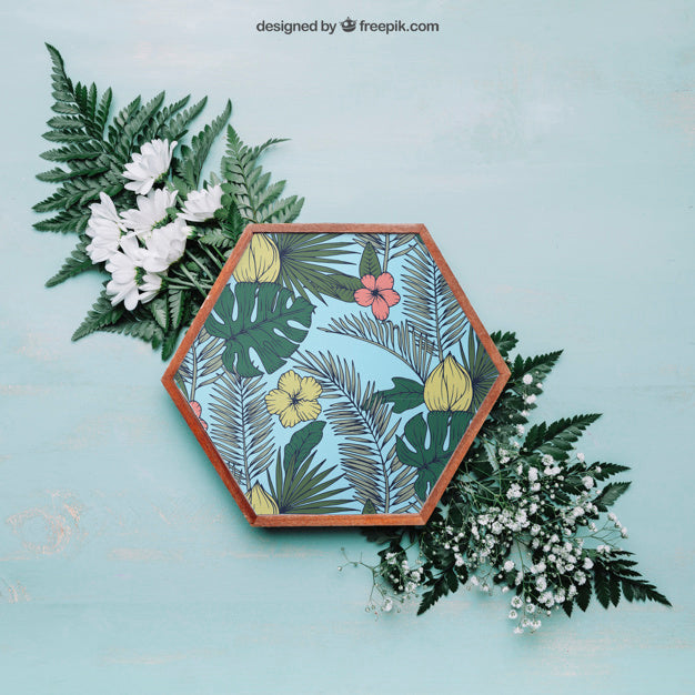 Botanical Mockup With Hexagonal Frame On Big Leaves Psd