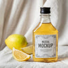 Bottle Of Mezcal Drink With Lemons Psd