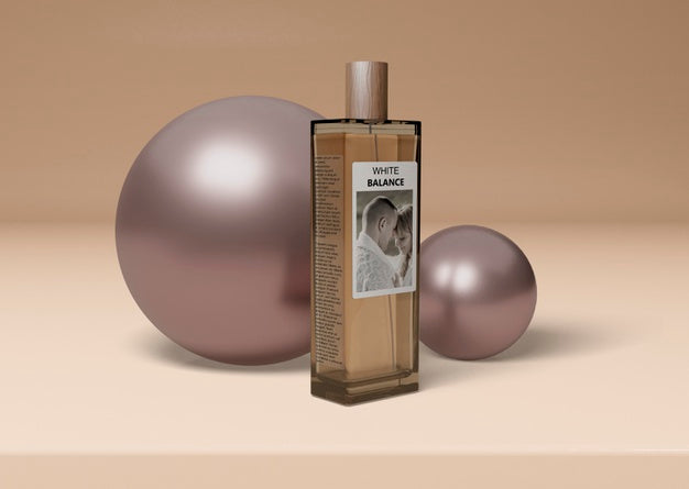 Bottle Of Perfume Beside Balls Psd