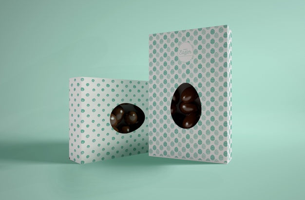 Boxes With Chocolate Eggs On Table Psd