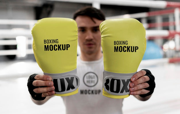 Boxing Athlete Holding Mock-Up Gloves To Train Psd