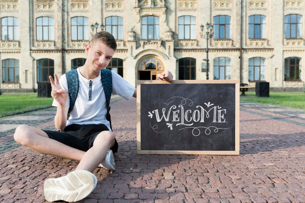 Boy Holding A Blackboard Mock-Up Psd