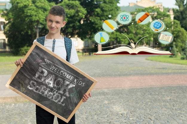 Boy Holding A Blackboard Mock-Up Psd