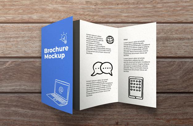 Brochure Mockup On Wooden Surface Psd