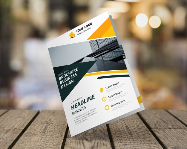 Brochure Mockup On Wooden Tabletop Psd