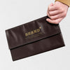 Brown Clutch Bag Mockup Held By A Woman Hand Psd